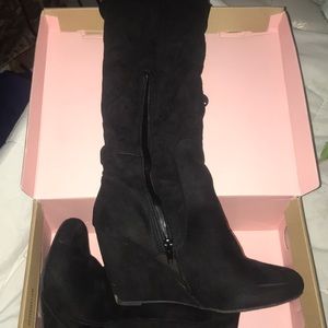 Black wedged over the knee boots